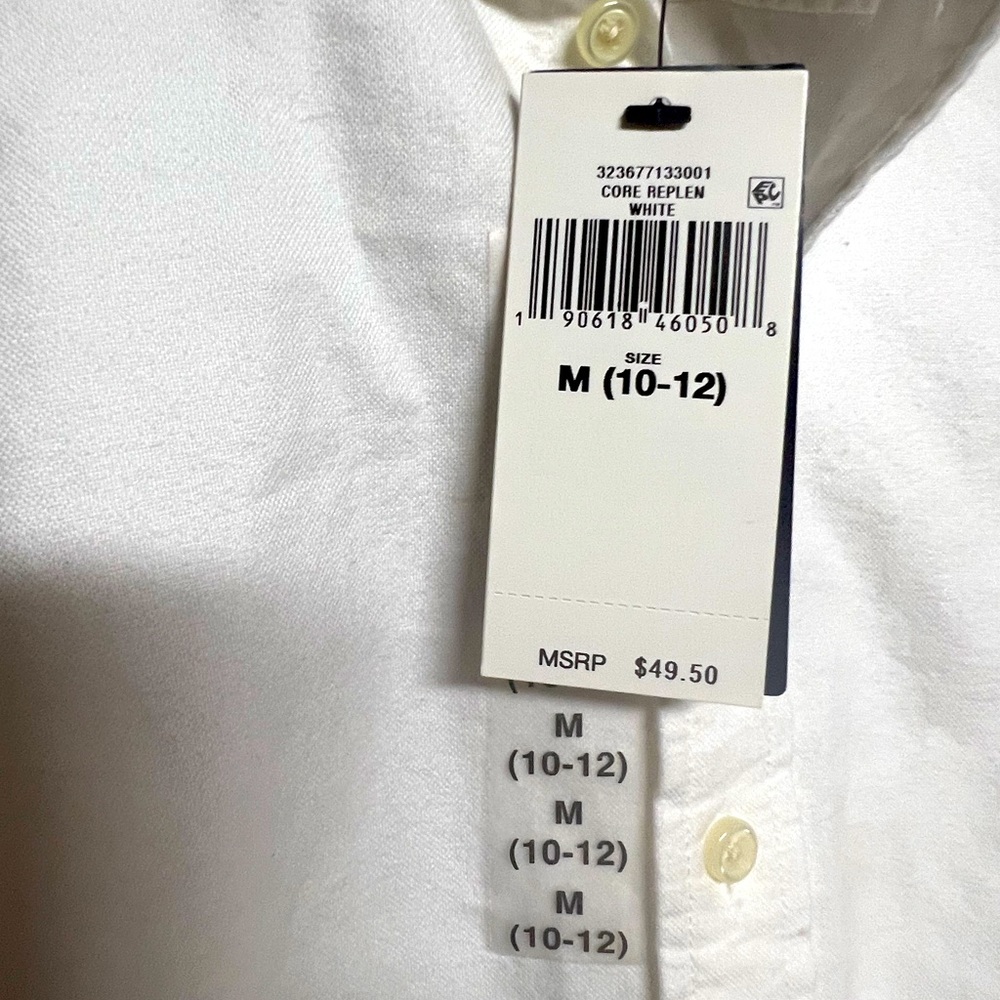 Boy’s size medium solid white Ralph Lauren button up. New with tags.